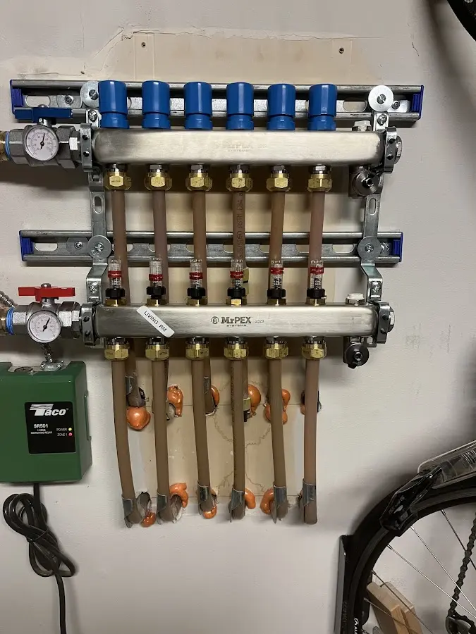 Plumber performing Leak Detection at a residential property in Danbury